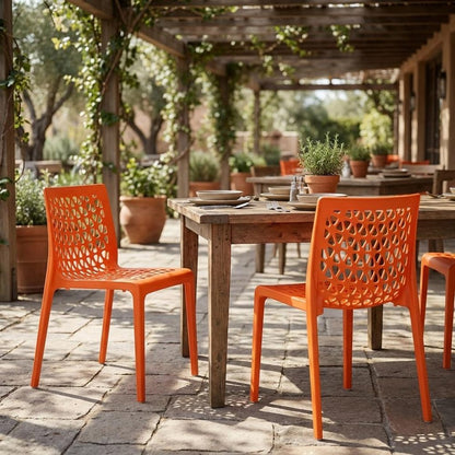 Set of Two Orange Heavy Duty Plastic Outdoor Stacking Dining Chairs HomeRoots