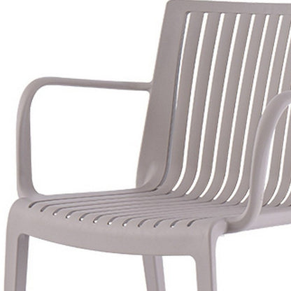 Set of Two Taupe Heavy Duty Plastic Outdoor Stacking Arm Chairs HomeRoots