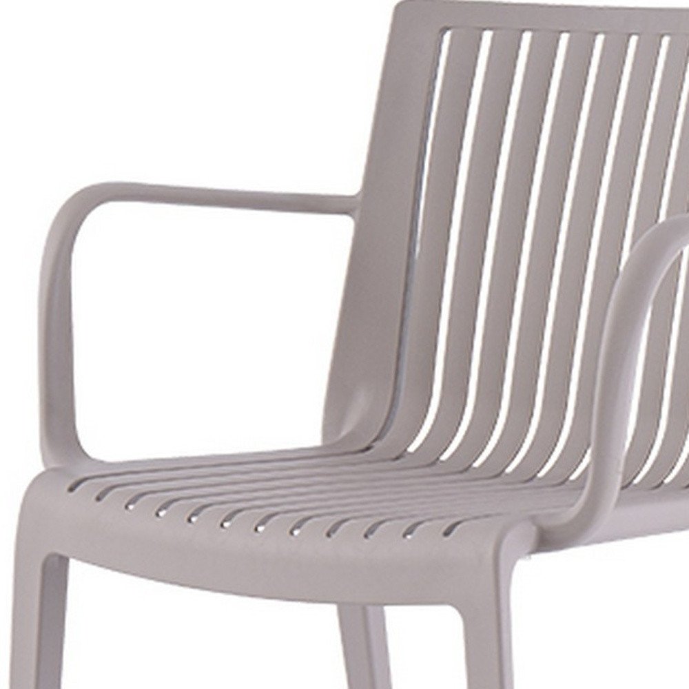 Set of Two Taupe Heavy Duty Plastic Outdoor Stacking Arm Chairs — view 5