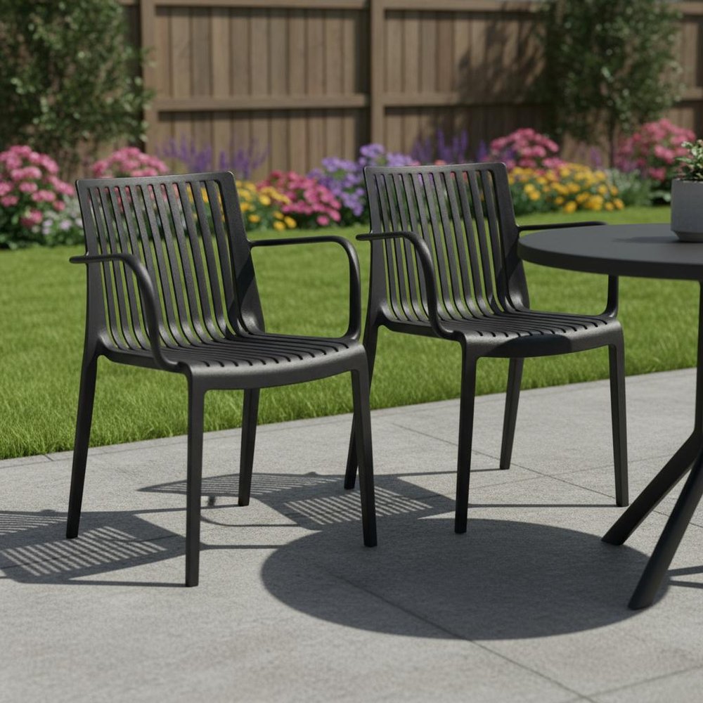 Set of Two Black Heavy Duty Plastic Outdoor Stacking Arm Chairs HomeRoots