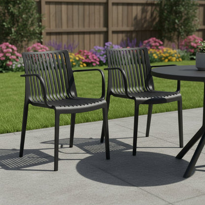 Set of Two Black Heavy Duty Plastic Outdoor Stacking Arm Chairs HomeRoots