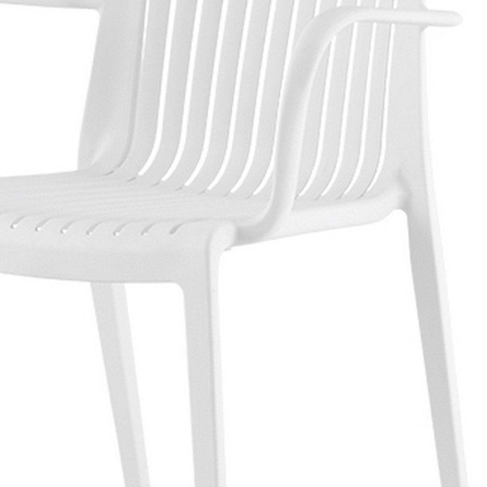 Set of Two White Heavy Duty Plastic Outdoor Stacking Arm Chairs HomeRoots