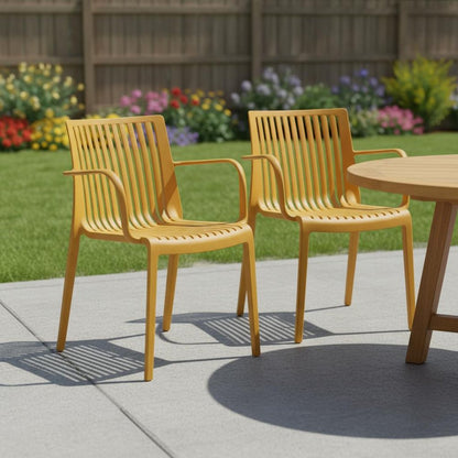 Set of Two Yellow Heavy Duty Plastic Outdoor Stacking Arm Chairs HomeRoots