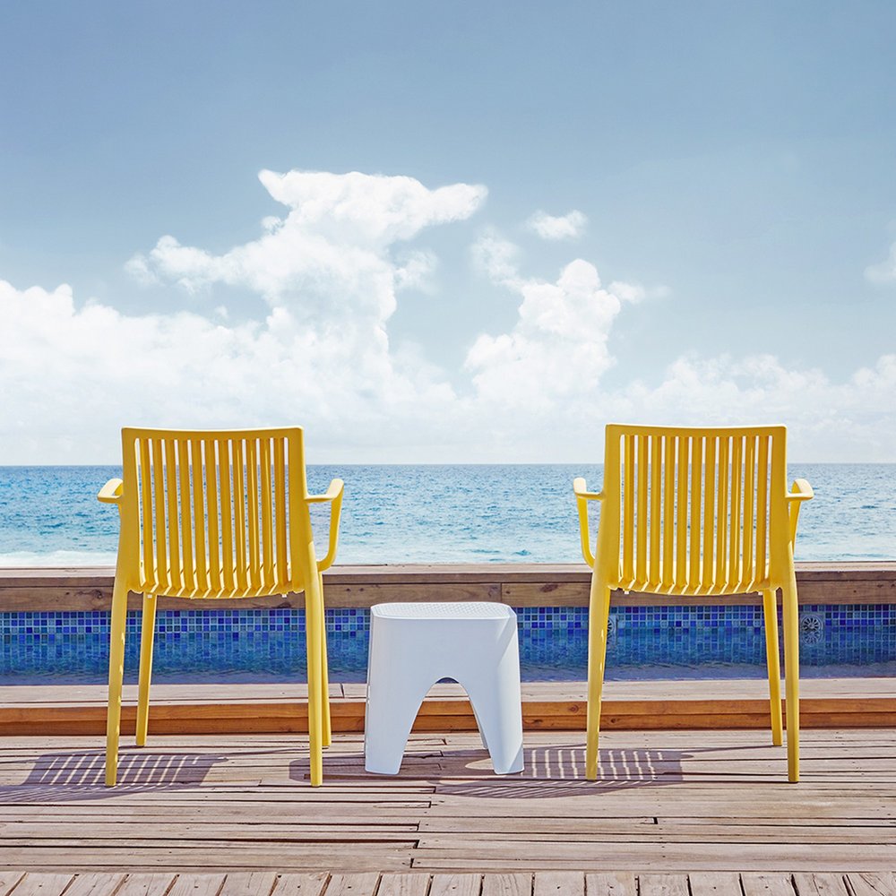 Set of Two Yellow Heavy Duty Plastic Outdoor Stacking Arm Chairs HomeRoots