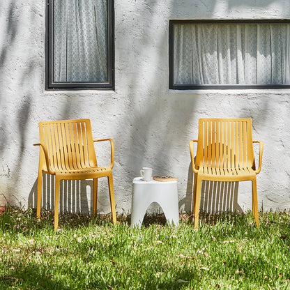 Set of Two Yellow Heavy Duty Plastic Outdoor Stacking Arm Chairs HomeRoots