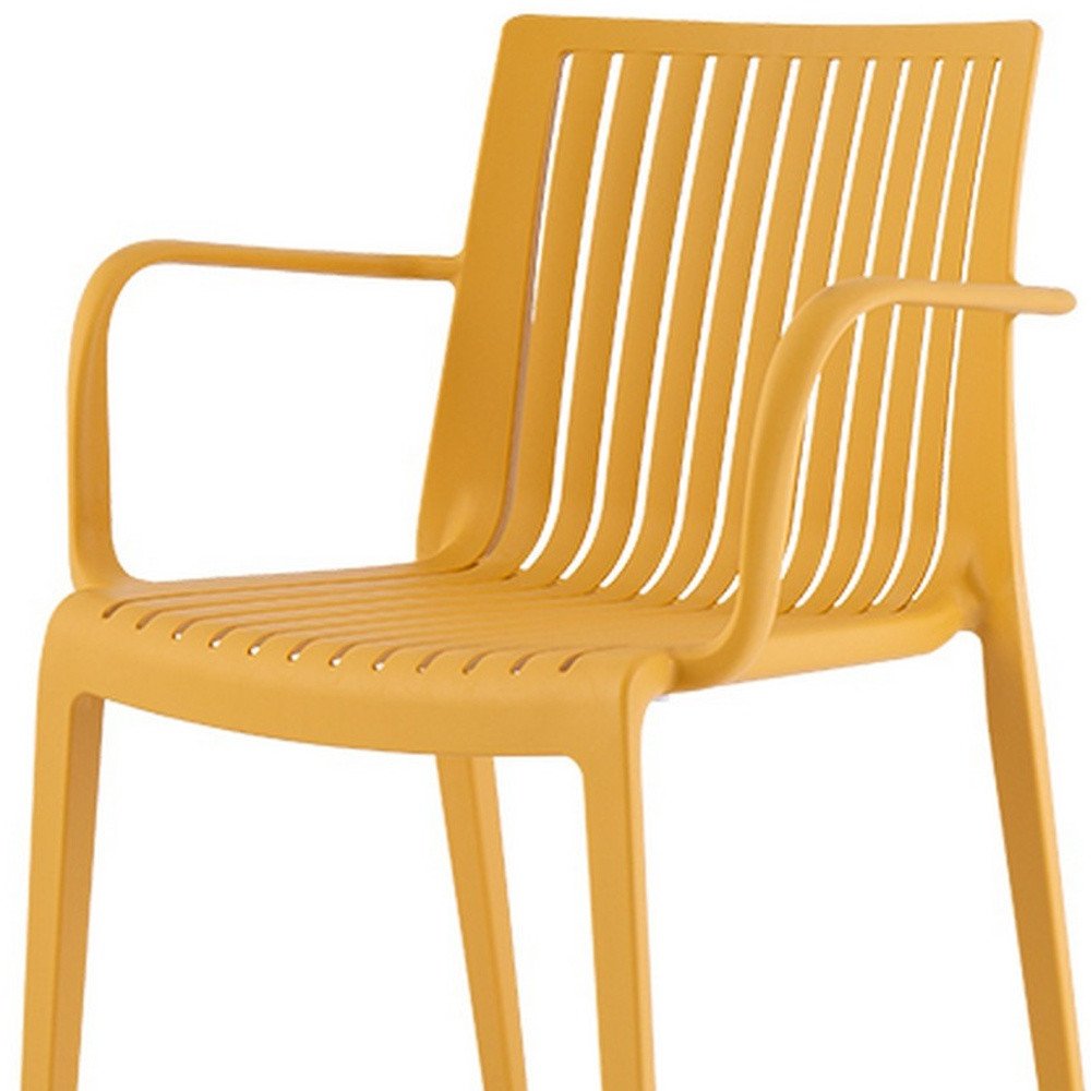 Set of Two Yellow Heavy Duty Plastic Outdoor Stacking Arm Chairs HomeRoots