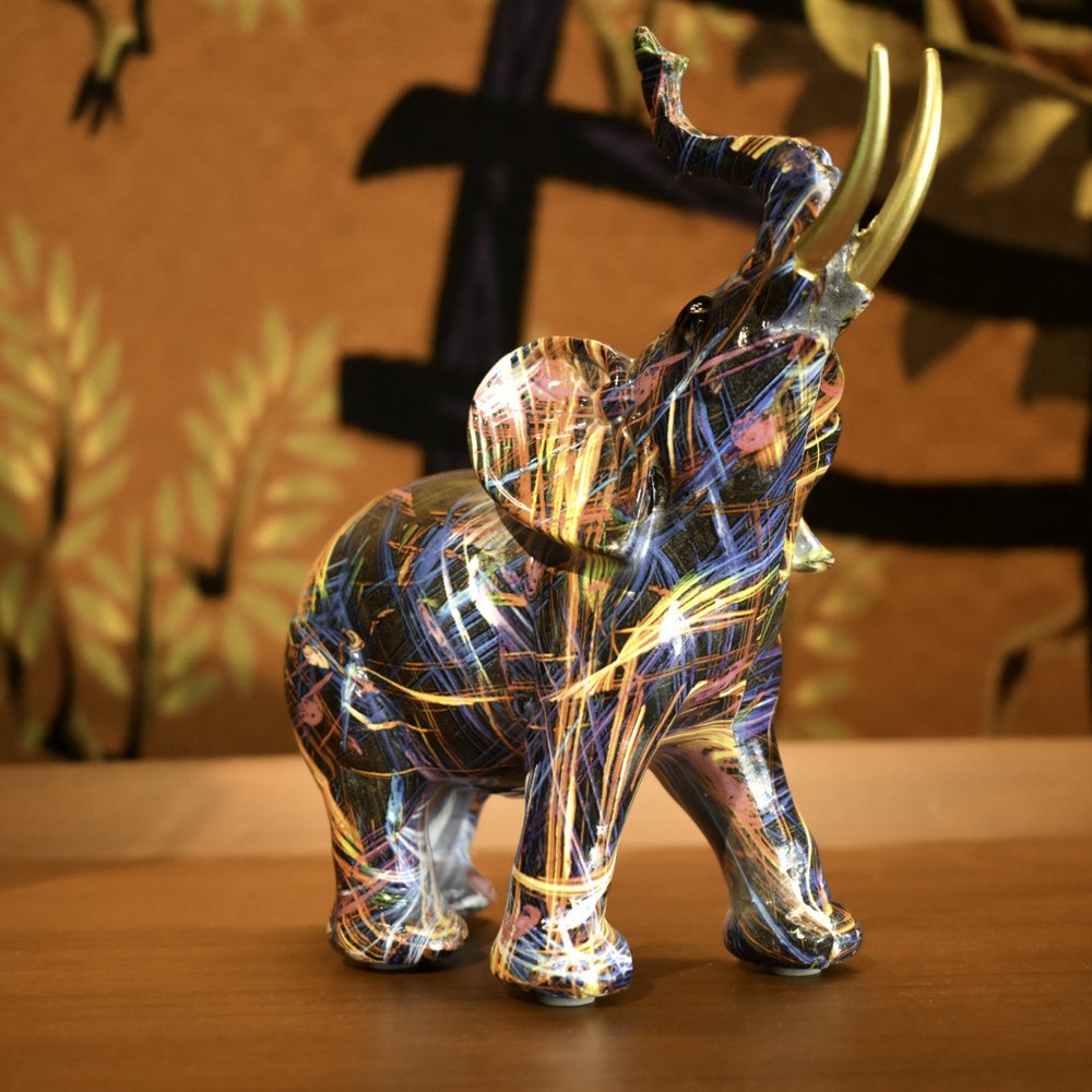 7" Blue Yellow And Pink Resin Elephant Tabletop Sculpture HomeRoots
