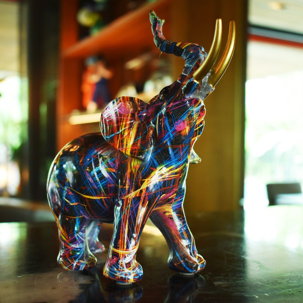 7" Blue Yellow And Pink Resin Elephant Tabletop Sculpture HomeRoots