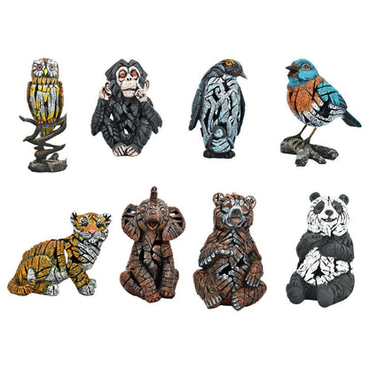 Set of Eight Brown White And Black Resin Panda, Bird, Bear, Monkey, Penguin, Elephant, Tiger, Owl Tabletop Sculpture HomeRoots