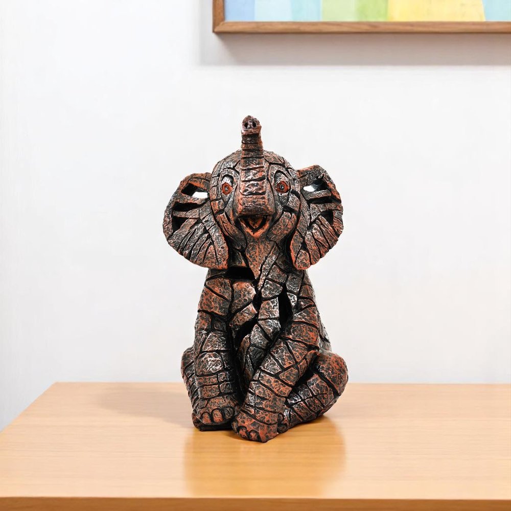6" Brown And White Resin Elephant Tabletop Sculpture HomeRoots