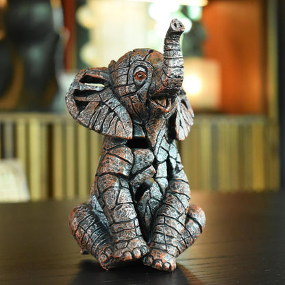 6" Brown And White Resin Elephant Tabletop Sculpture HomeRoots