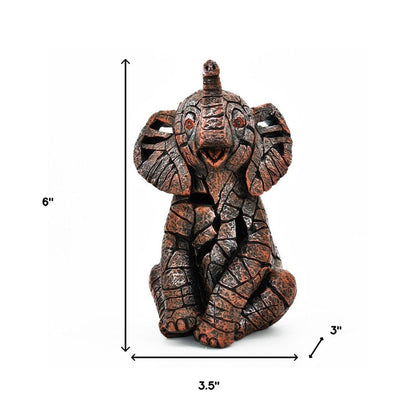 6" Brown And White Resin Elephant Tabletop Sculpture HomeRoots