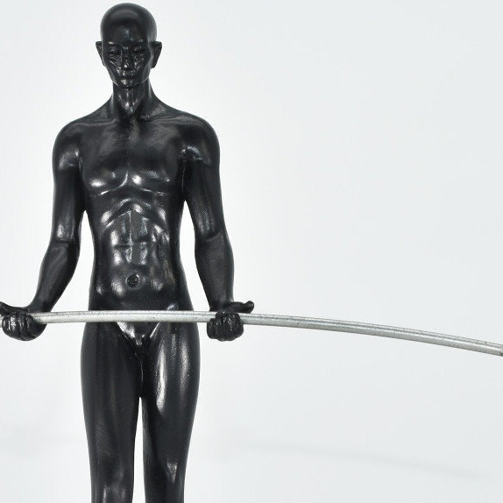 8" Black Resin Man Tabletop Sculpture HomeRoots
