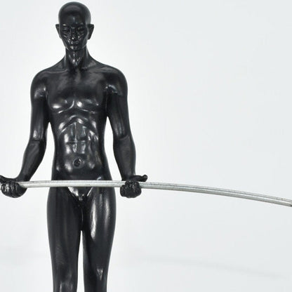 8" Black Resin Man Tabletop Sculpture HomeRoots