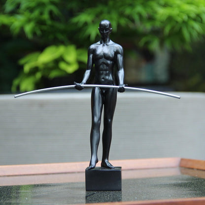8" Black Resin Man Tabletop Sculpture HomeRoots