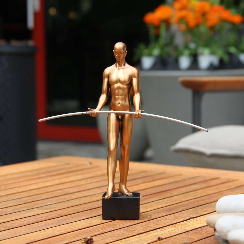 8" Bronze Resin Man Tabletop Sculpture HomeRoots