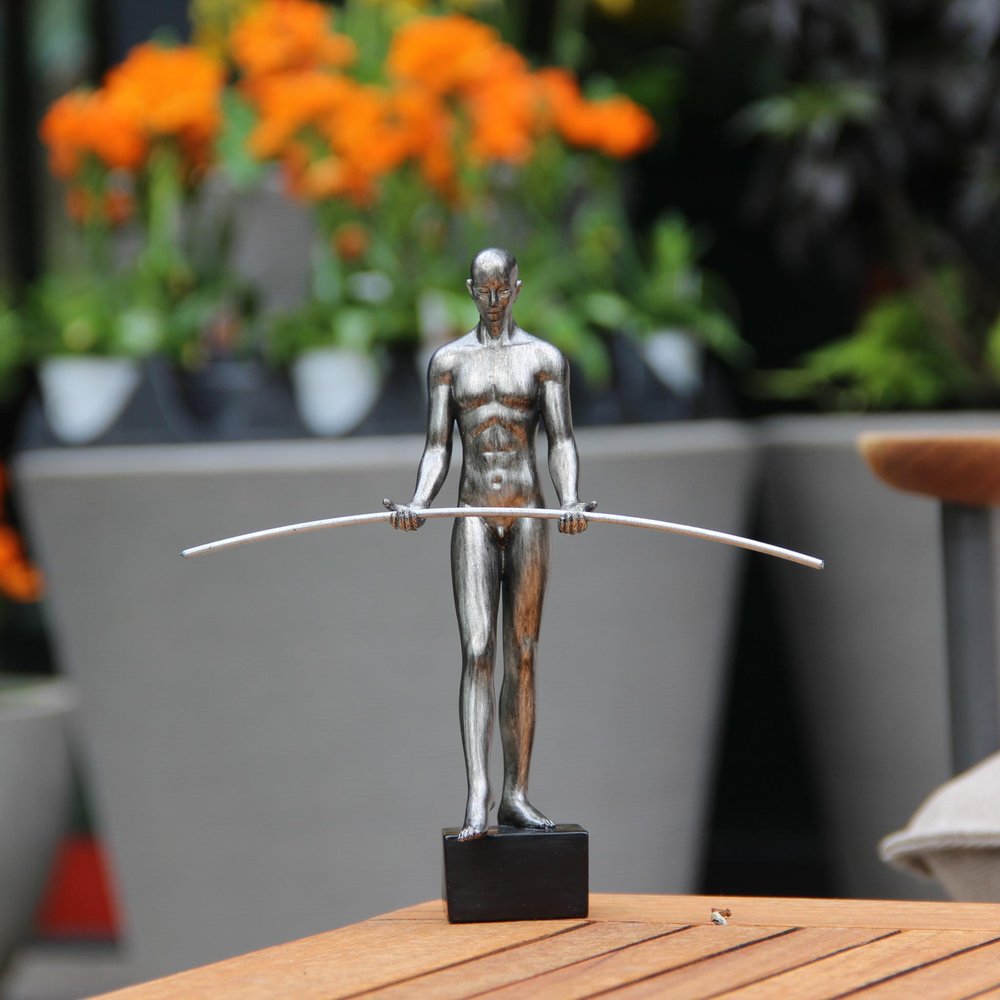 8" Pewter Resin Man Tabletop Sculpture HomeRoots