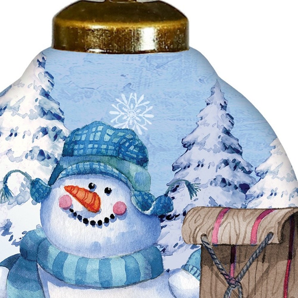 Sled Snowman Hand Painted White Blue And Brown Glass Finial Ornament HomeRoots