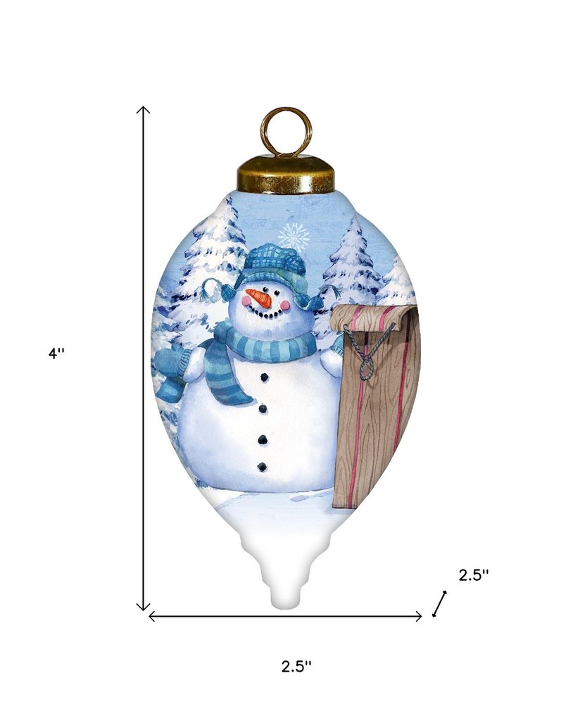 Sled Snowman Hand Painted White Blue And Brown Glass Finial Ornament HomeRoots