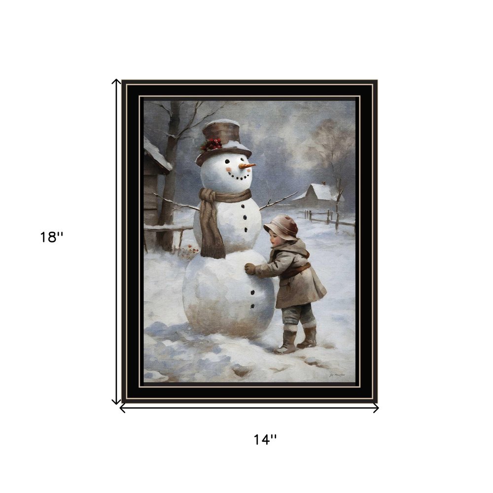 Boy Building A Snowman Black Framed Wall Art — view 4
