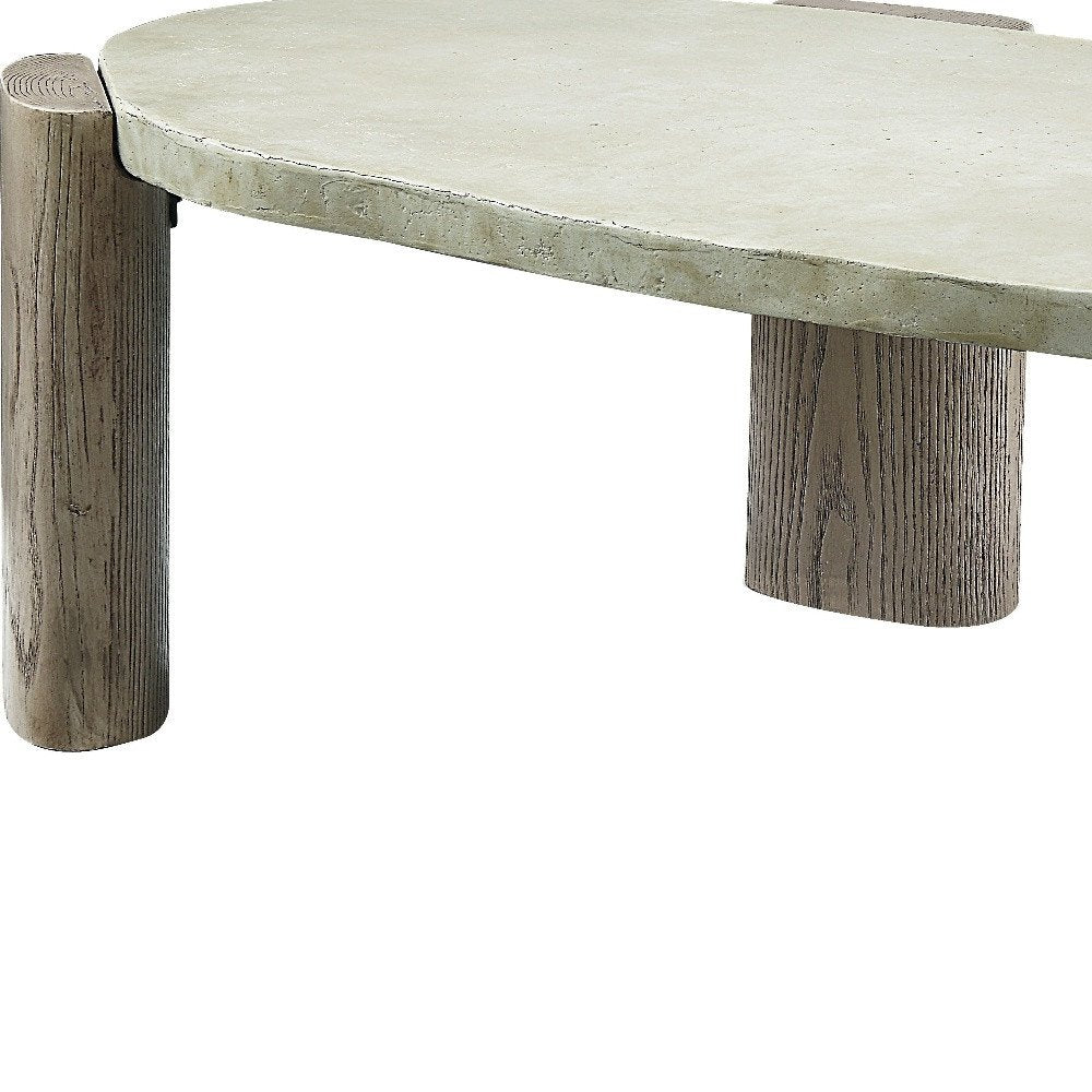 47" Beige and Oak Distressed Cement Oval Coffee Table HomeRoots