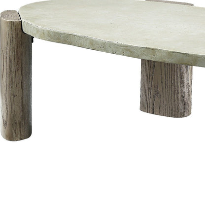 47" Beige and Oak Distressed Cement Oval Coffee Table HomeRoots