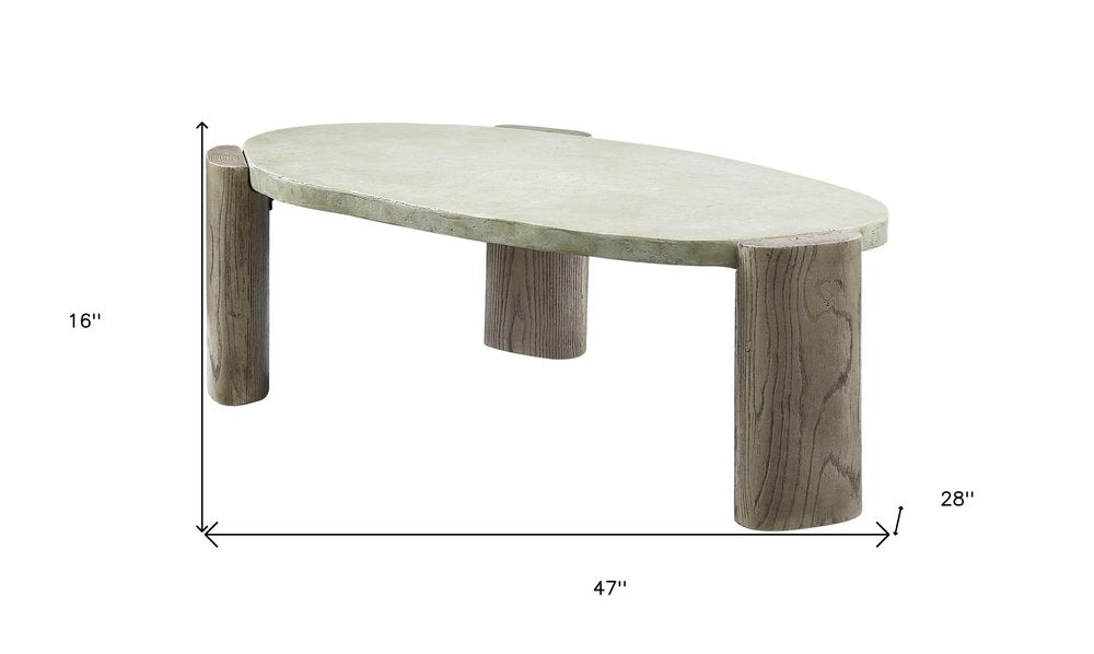 47" Beige and Oak Distressed Cement Oval Coffee Table HomeRoots