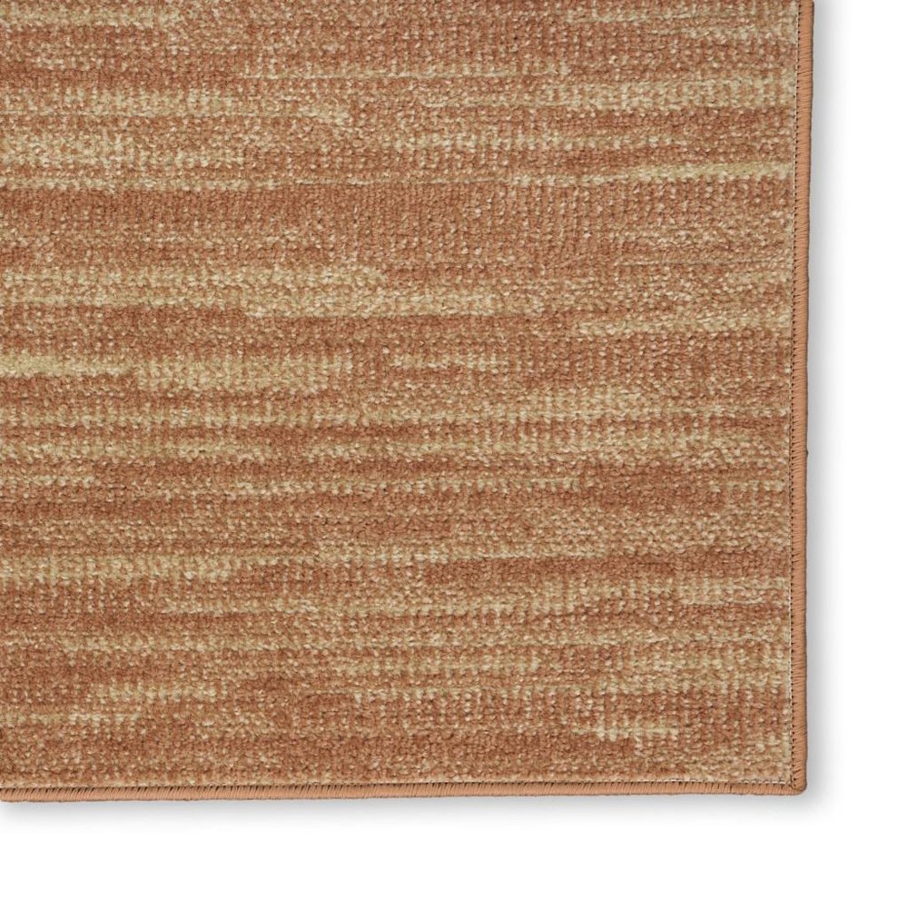 2' X 4' Rust And Beige Abstract Indoor Outdoor Area Rug