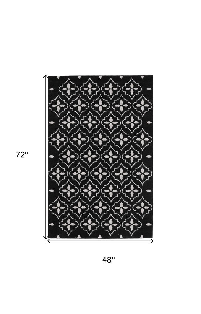 4' X 6' Black And Ivory Geometric Indoor Outdoor Area Rug HomeRoots