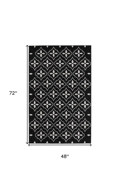 4' X 6' Black And Ivory Geometric Indoor Outdoor Area Rug HomeRoots