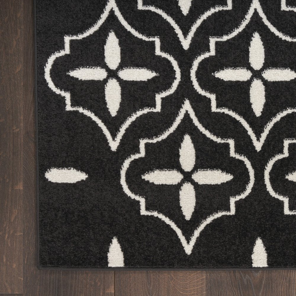 4' X 6' Black And Ivory Geometric Indoor Outdoor Area Rug — view 11