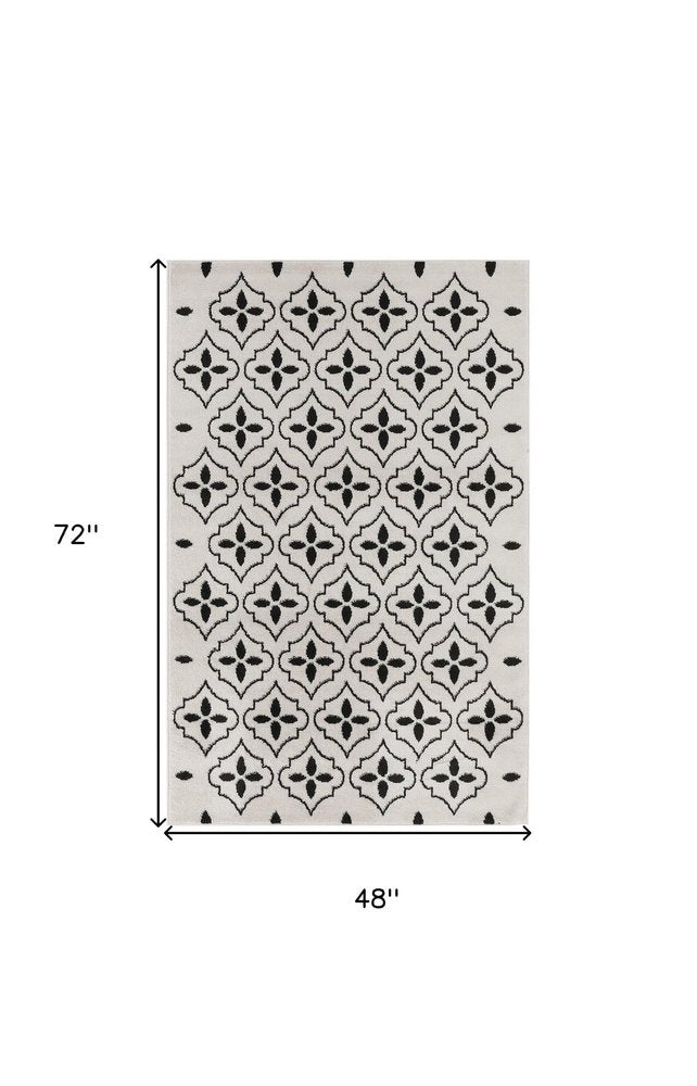 4' X 6' Ivory And Black Geometric Indoor Outdoor Area Rug HomeRoots