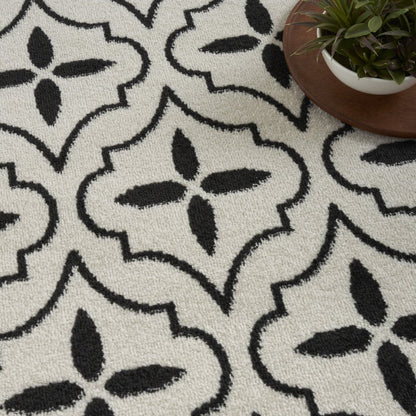 4' X 6' Ivory And Black Geometric Indoor Outdoor Area Rug