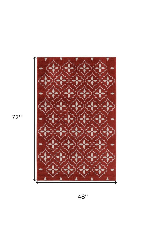 4' X 6' Brick Red And Ivory Geometric Indoor Outdoor Area Rug