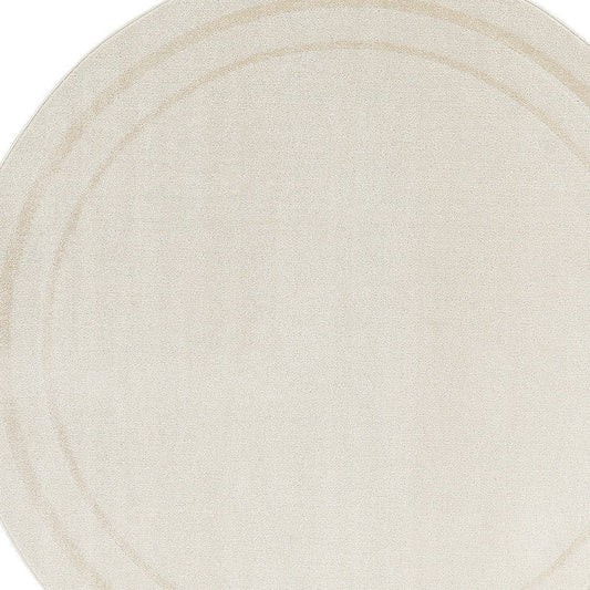 8' Ivory And Gold Round Indoor Outdoor Area Rug