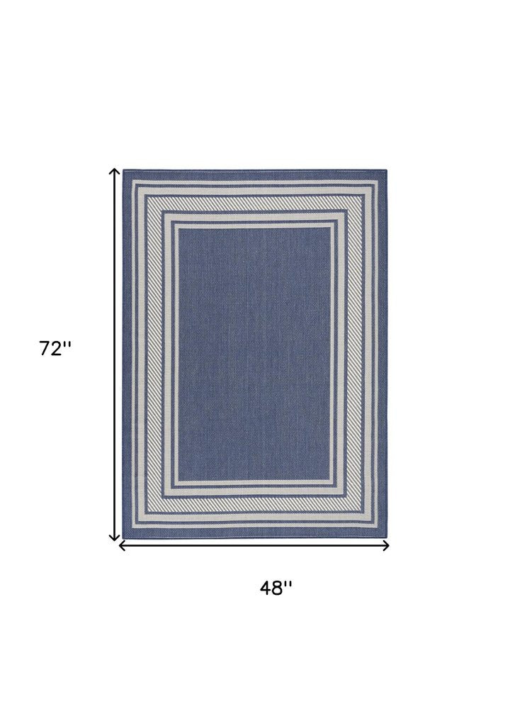 4' X 6' Navy Blue And Ivory Geometric Indoor Outdoor Area Rug HomeRoots