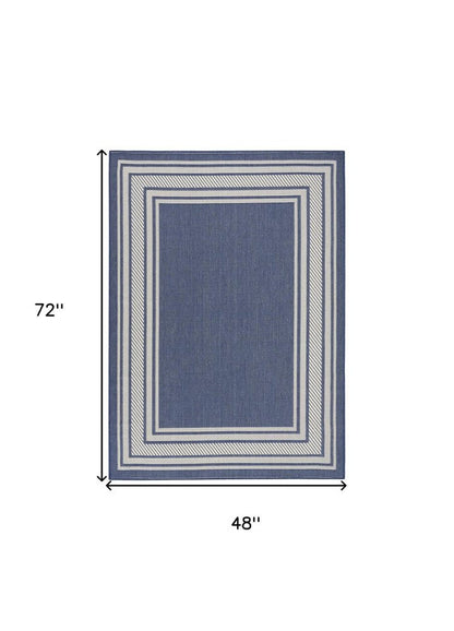 4' X 6' Navy Blue And Ivory Geometric Indoor Outdoor Area Rug HomeRoots