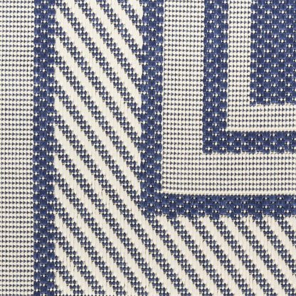 4' X 6' Navy Blue And Ivory Geometric Indoor Outdoor Area Rug