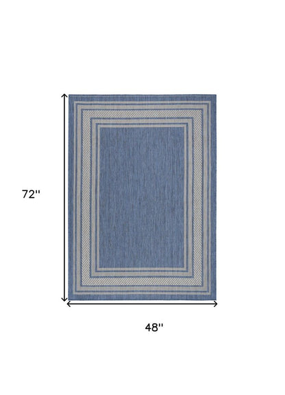 4' X 6' Denim Blue And Ivory Geometric Indoor Outdoor Area Rug HomeRoots