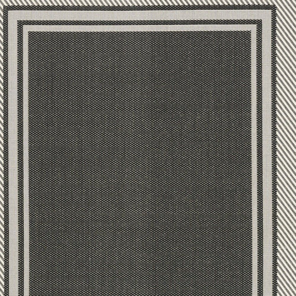 5' X 7' Black Geometric Indoor Outdoor Area Rug