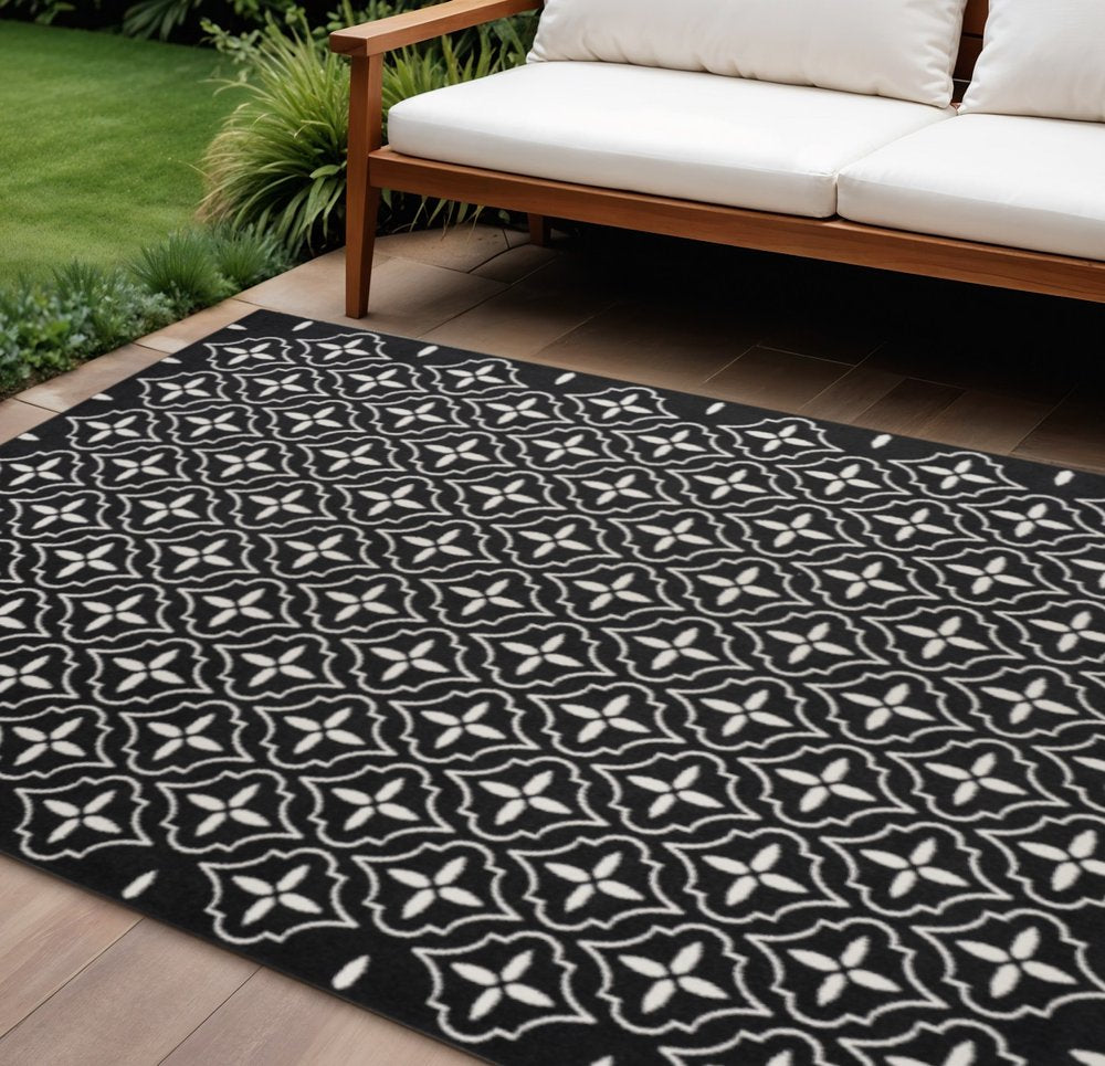 6' X 9' Black And Ivory Geometric Indoor Outdoor Area Rug — view 2