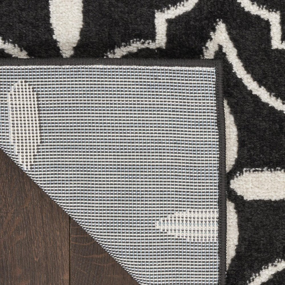 6' X 9' Black And Ivory Geometric Indoor Outdoor Area Rug HomeRoots