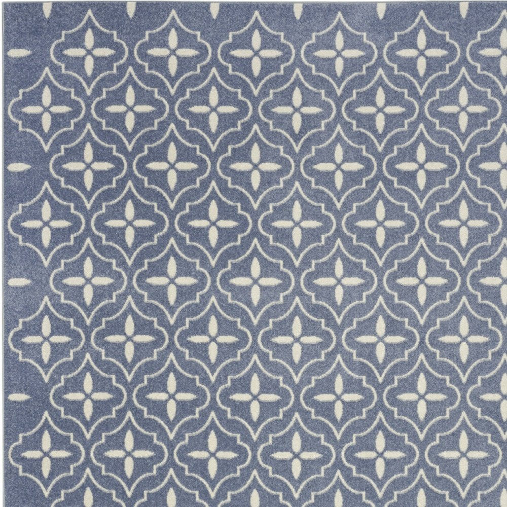 6' X 9' Blue And Ivory Geometric Indoor Outdoor Area Rug — view 1