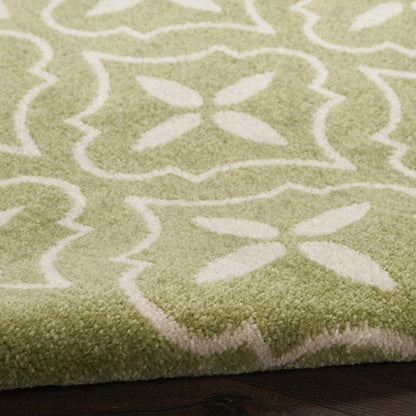 6' X 9' Green And Ivory Geometric Indoor Outdoor Area Rug