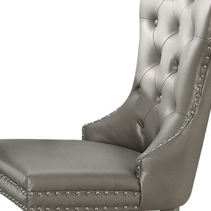 Set of Two Champagne Tufted Faux Leather And Solid Wood Wing Back Dining Side Chairs HomeRoots