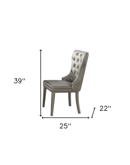 Set of Two Champagne Tufted Faux Leather And Solid Wood Wing Back Dining Side Chairs HomeRoots