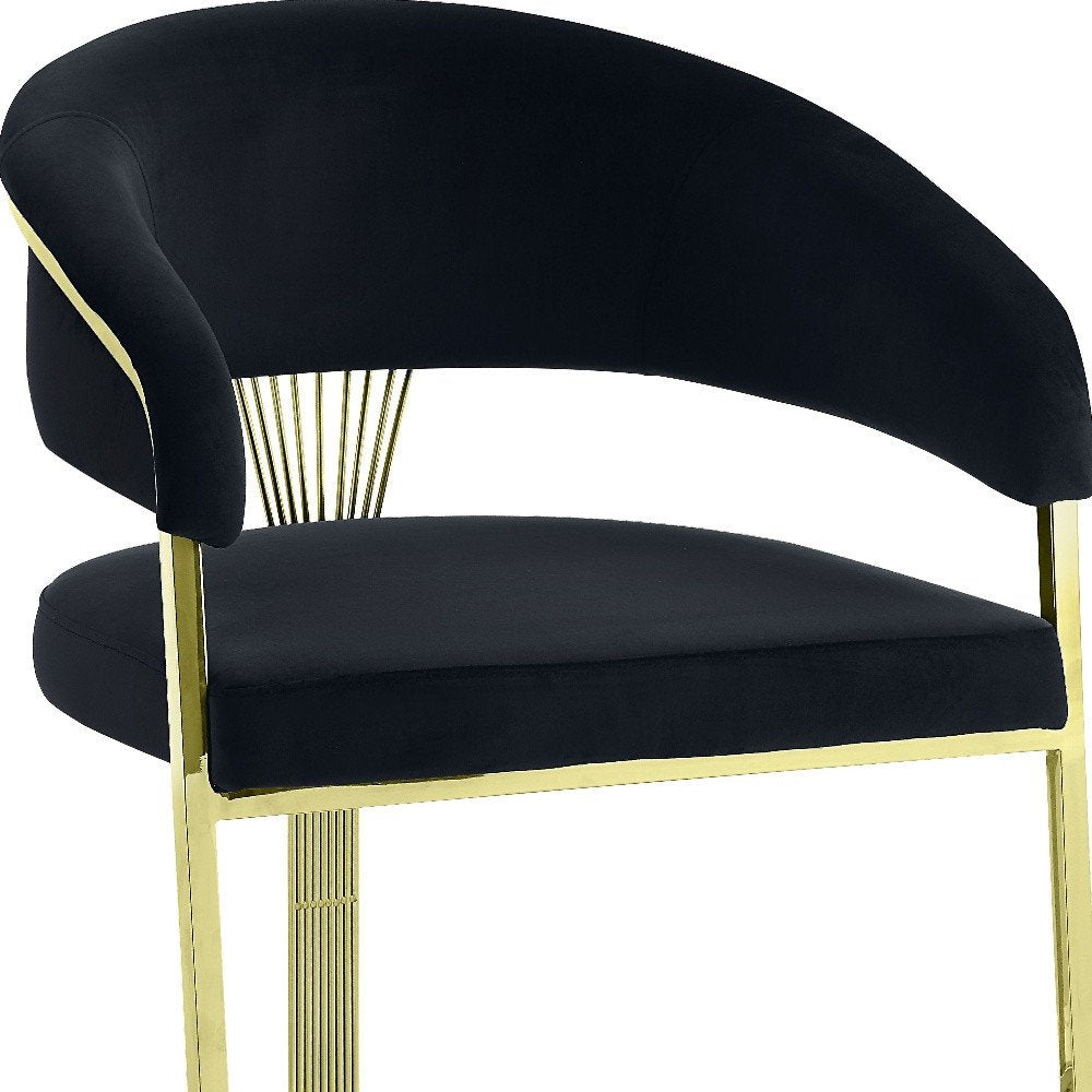Black and Gold Upholstered Velvet Partially Open Back Dining Side Chair HomeRoots