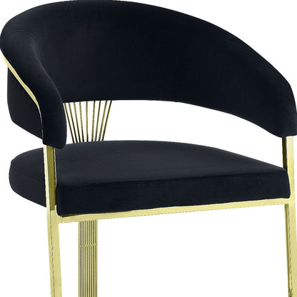 Black and Gold Upholstered Velvet Partially Open Back Dining Side Chair HomeRoots