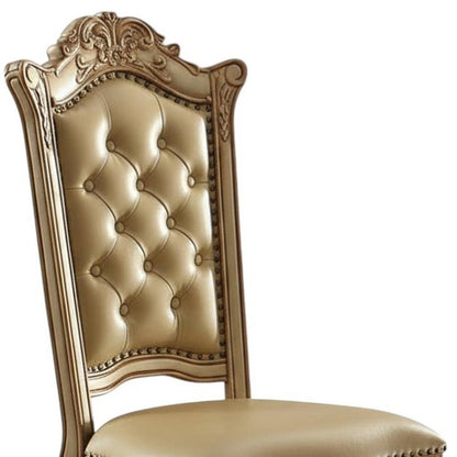 Set of Two Tufted Bone and Brass Upholstered Faux Leather And Wood Dining Side Chairs HomeRoots