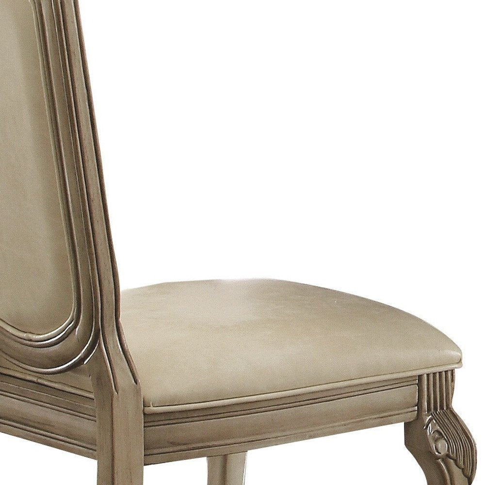 Set of Two Antiqued White Upholstered Faux Leather Dining Side Chairs HomeRoots